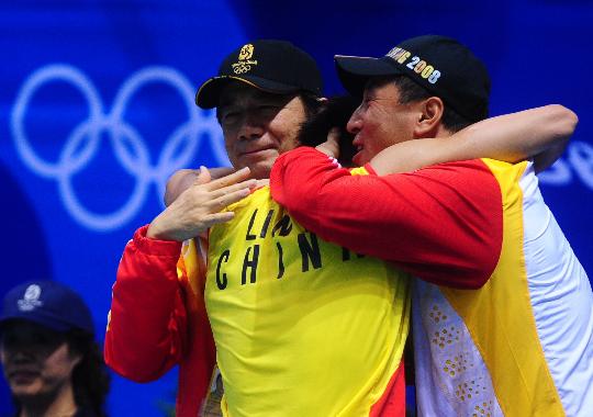 图文-羽毛球男单林丹夺金 胜利属于这个团队