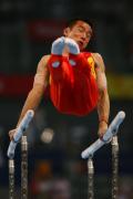 图文-奥运会男子体操资格赛开战 肖钦的双杠表演