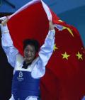 图文-吴静钰获女子49公斤级冠军 国旗此时更鲜艳