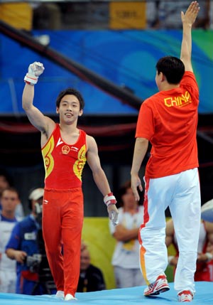 Zou Kai of China wins horizontal gold medal