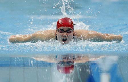 Photo:Liu wins women's 200m butterfly gold in world record time