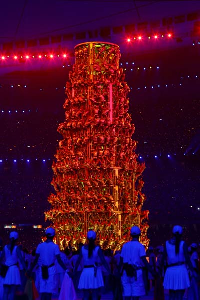 Photo: Acrobats perform on memory tower