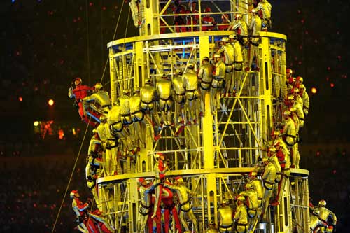 Photo: Acrobats perform on memory tower