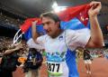 图文-男子链球斯洛文尼亚选手夺金 冠军披上国旗