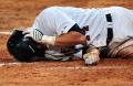 图文-18日棒球比赛赛况 美国队员被撞倒地