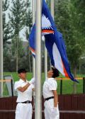 图文-马绍尔群岛奥运代表团举行升旗仪式 升起国旗