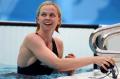 图文-女子100米自由游泳决赛 看到满意的成绩