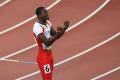 图文-奥运会男子110米栏决赛 罗伯斯庆祝夺冠