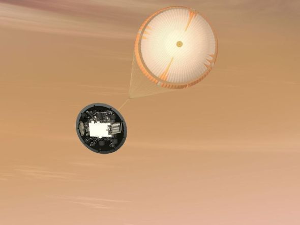 明年8月份，好奇号抵达火星，打开降落伞在火星大气中减速