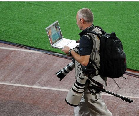 奥运报道谁作主 体育摄影记者装备揭秘_数码