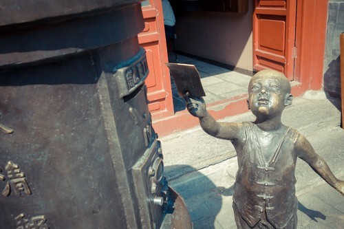 高画质+大光圈索尼QX100街拍后海人文