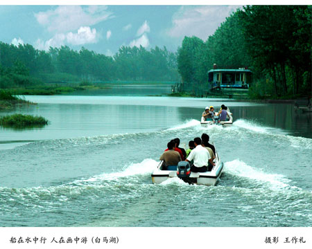 从洪泽湖风情摄影艺术展看淮安旅游