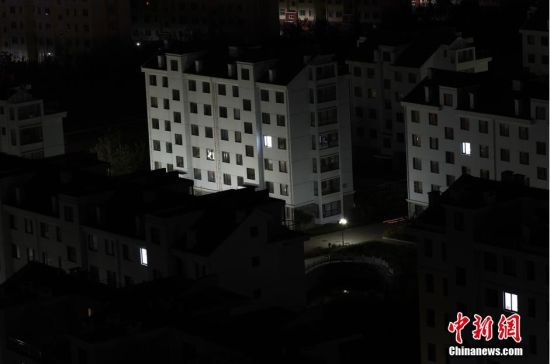 图为一到夜晚一些小区亮灯的楼屈指可数。图片来源：东方IC 版权作品 请勿转载