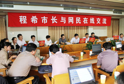 【微专访】仪征市市长程希聊汽车名城建设
