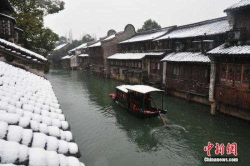 资料图 世界互联网大会永久性举办地——浙江省嘉兴市乌镇。 代表点赞特色小镇“浙江经验”:促经济转型谋城乡统筹