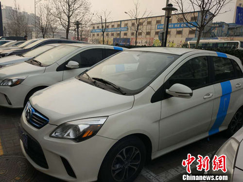 北京街头的“共享汽车”。 官方拟规范共享汽车 私家车改“性质”也能共享