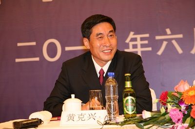 图注:图为青岛啤酒股份有限公司总裁黄克兴