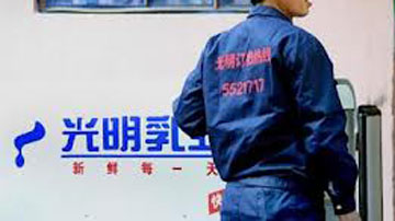 光明乳业提价消化成本