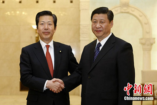 12月15日，中国国家副主席习近平在北京人民大会堂会见由党首山口那津男率领的日本公明党代表团。中新社记者 盛佳鹏 摄