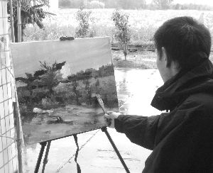 一位画家在作画.