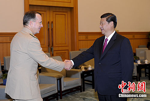 7月11日，中国国家副主席习近平在北京人民大会堂会见了美军参谋长联席会议主席迈克·马伦。中新社发 廖攀 摄