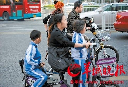 深圳规定自行车载人罚200元被指太霸道
