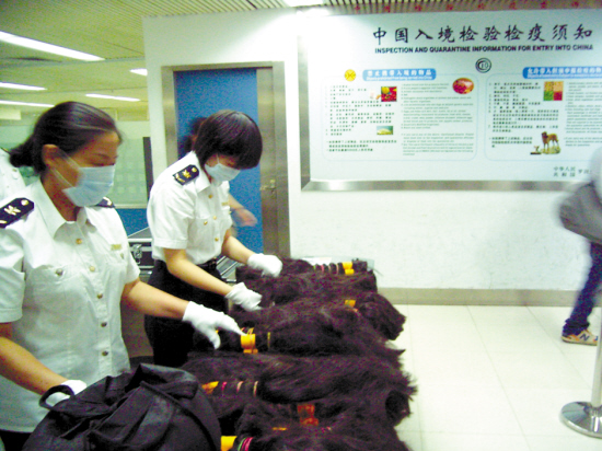 <em>人体头发</em>也走私_新闻中心_新浪网
