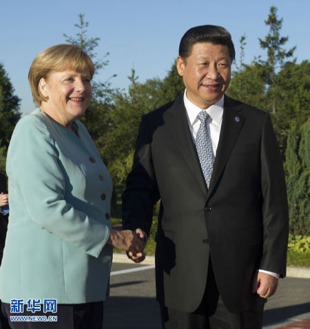 习近平分别会见美国总统奥巴马、<em>德国总理默克</em>