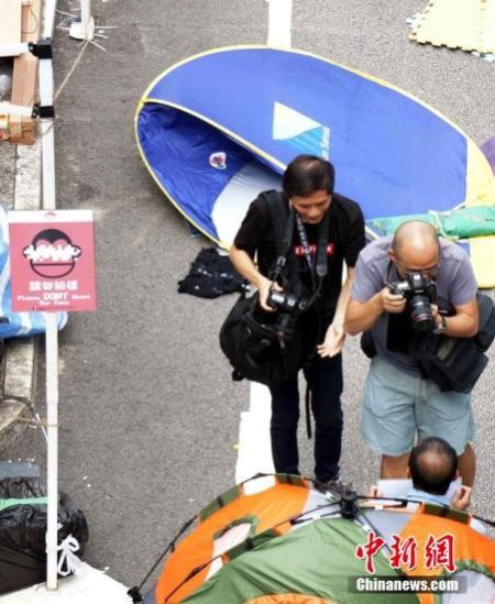 香港警方：有违法“占中”者不肯承担法律责任