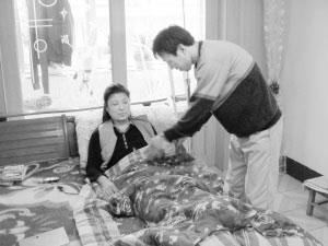 陌生男子打工赚钱照顾重病女子(图)