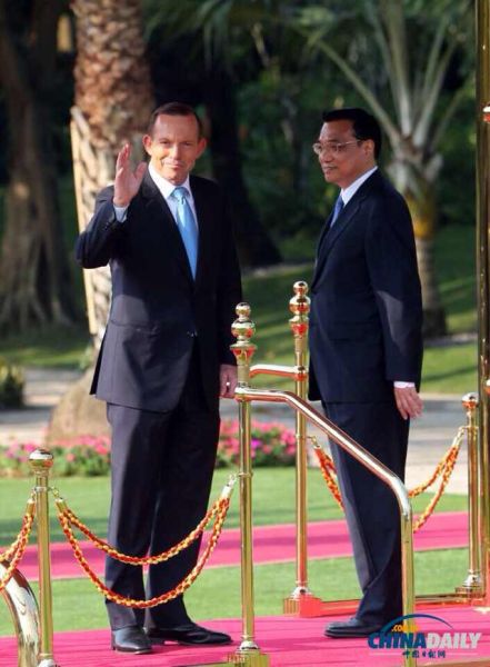 李克强在三亚举行仪式欢迎澳大利亚总理阿博特