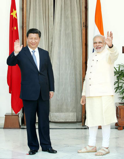 外媒关注"世界工厂"与"世界办公室"强强联合 - 中文国际 - 中国日报网