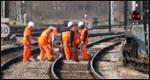 Railway workers working on the track