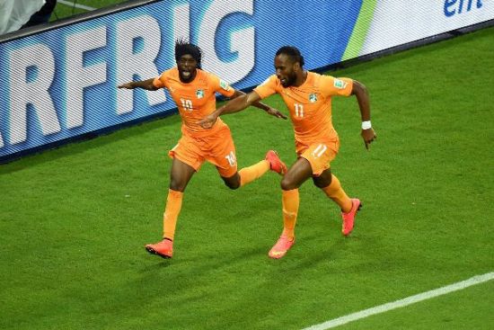 Ivorians Gervinho and Didier Drogba after Gervinho winner over Japan