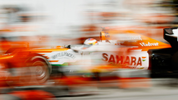 Paul di Resta of Great Britain drives in for a pitstop during the Bahrain Formula One Grand Prix