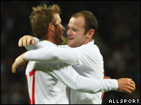 David Beckham and Wayne Rooney celebrating a goal