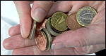 Coins in someone's hand