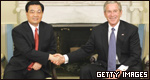 Wen Jiabao shakes hands with George Bush 