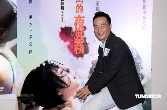 组图:任达华报复张静初 海报上掐对方脖子