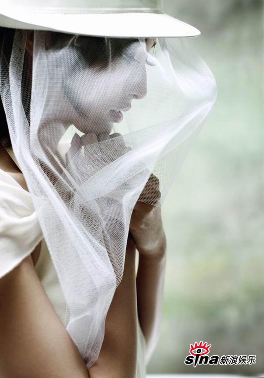 吴佩慈婚纱写真 妩媚新娘秀出万种风情【图】