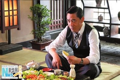 陈宝国扮演中村功