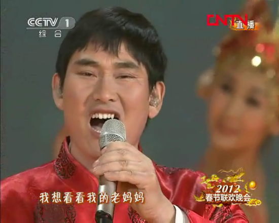 组图:农民歌手朱之文演唱《我要回家》
