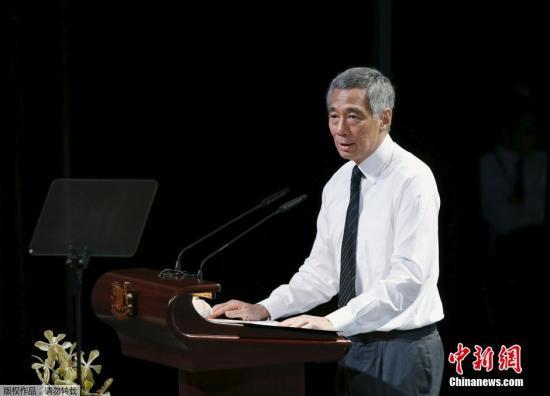 境外媒体：李光耀国葬民众沿途守候冒雨送行