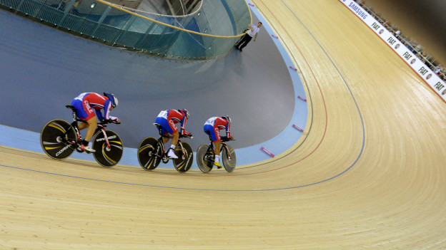 Cyclists take part in a race at the 2012 London Velodrome