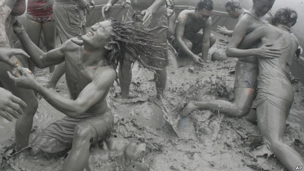 Tourists playing in the mud during the 15th annual mud festival on Daecheon Beach in Boryeong, South Korea.