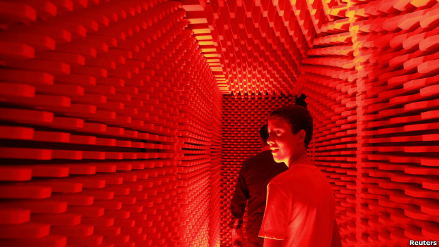 People visiting an echo-free chamber in Valetta.