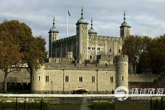 Looking past the Tower of London from Thames River