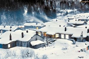 The whole village lying in the snow.