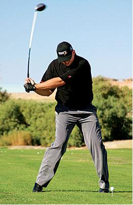 球技-图解世界长击球的秘密(4) 伸展手臂躯干发