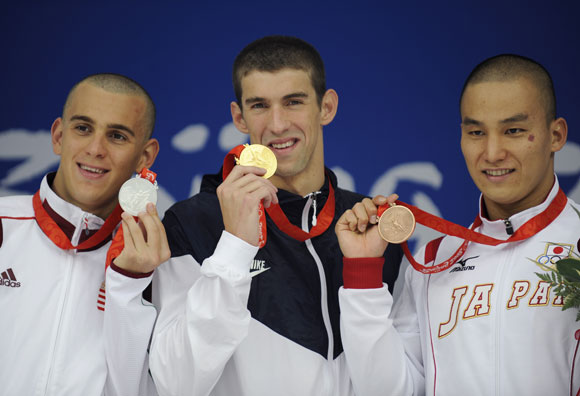 资料图片-北京奥运会男子200米蝶泳前三名合影